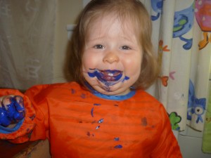 Thea (above) was using wheels and circles to make prints onto paper today!!!