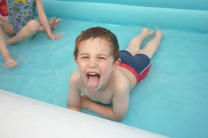 Here is Dathan making the most of our giant paddling pool. We have had the pool out ALL WEEK!!! Actually we have 2 pools. This is the noisy splashy pool that is very popular with all the boys and Thea!! The other is a smaller and quieter pool for those of us who don't like being splashed.