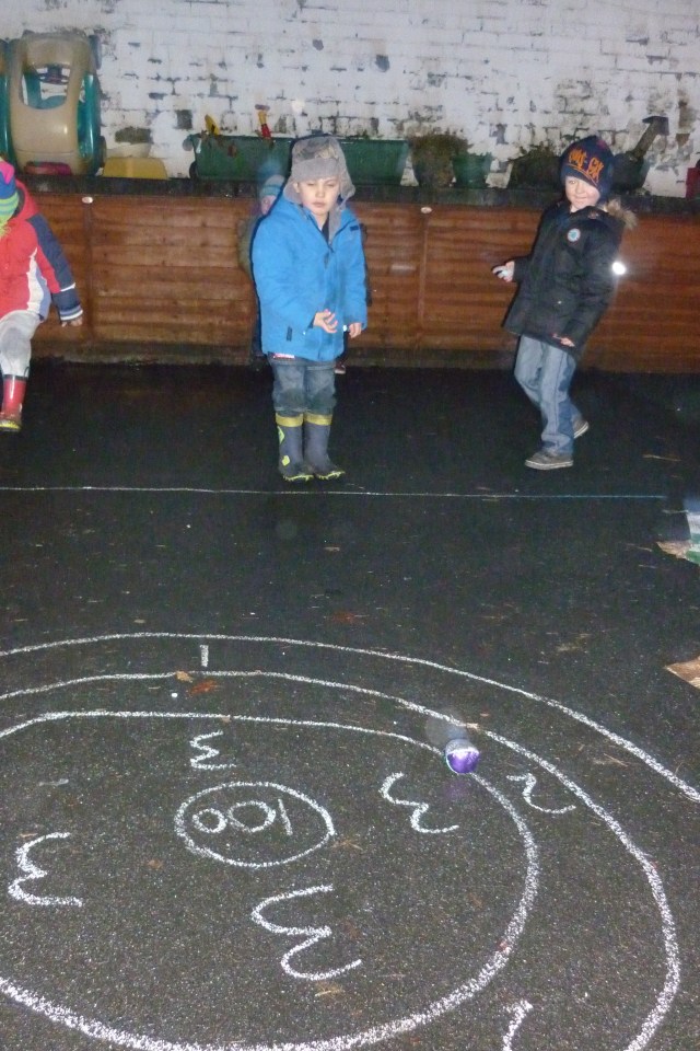Here are some of our Superheroes having fun with target practise. The children were challenged to add numbers together and mark them onto a score board. This involved them working co-operatively together, taking turns to throw and helping each other out.