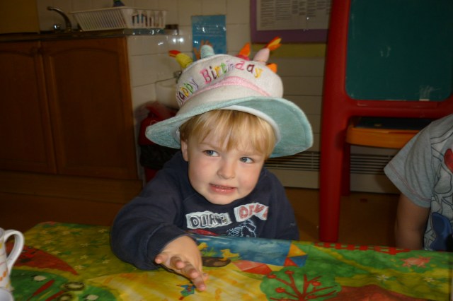 Yes, we were surprised he wanted to wear he hat as well!! There was a cake but it didn't last long.