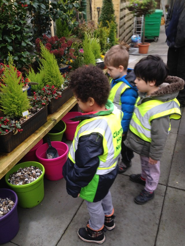 This is us at Anniesland Pet and Garden Centre. We came here to help choose some young plants that we plan to plant in the Children's Wood next week. The man who served us gave us a bird feeder for our garden and told us to watch out for Goldfinches.