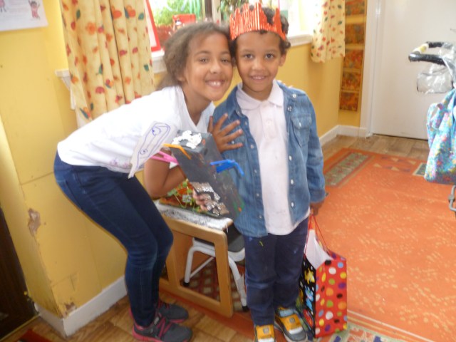 This was Marcello's last day today. He made a robot, played on the bouncy castle and made a crown too!! 