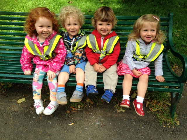 Don't we look cute sitting here in the park. This seat is about the half way point during our morning walk.